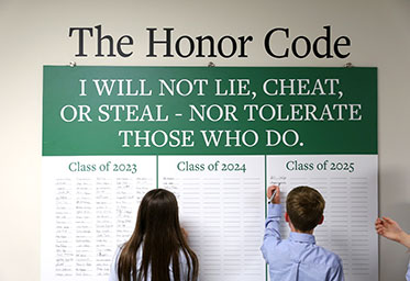 Students signing The Honor Code for their class year. Links to What to Give