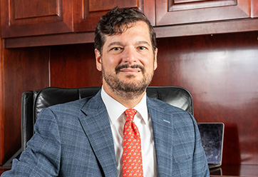 R. Deno Cole ’90. Link to his story