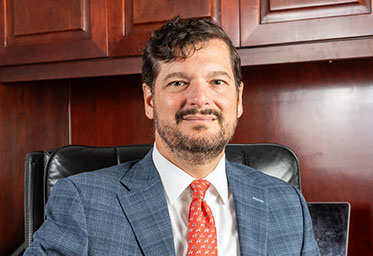 R. Deno Cole ’90. Link to his story